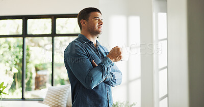 Buy stock photo Thinking, coffee and man in home with reflection, nostalgia or memory on weekend in living room. Decision, smile and male person with warm beverage for choice or plan in apartment with daydreaming.