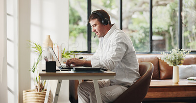 Buy stock photo Businessman, agent and laptop with headset in home for online advice or customer service. Man, freelance consultant or remote work with computer for virtual assistance, web support or help in house