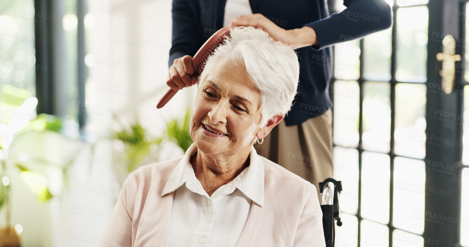 Buy stock photo Old woman, nurse and hairbrush with wheelchair for grooming, helping hand and smile in retirement home. People, caregiver and elderly person with disability, assisted living and support in house