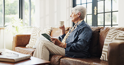 Buy stock photo Coffee, tablet and think with old woman in home for movie choice, relax or daydream in retirement. Tea, technology and elderly person on sofa for reflection, thoughts or decision for film on weekend