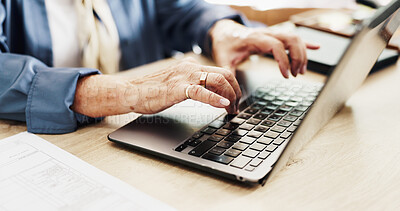 Buy stock photo Hands, laptop and typing in home with documents for finance, budget or review in living room. Elderly person, computer and paperwork with notes, asset management or insurance in retirement at house