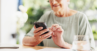 Buy stock photo Phone, relax and hands with senior woman in home for social media, reading and online. App, connection and wellness with person in apartment for internet search, text message and typing in retirement