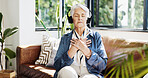 Old woman, headphones and couch yoga with breathing in home, sound and streaming service in living room. Person, smile and listen to meditation music with subscription, audio and eyes closed on sofa