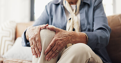 Buy stock photo Hands, knee pain and injury in sofa in retirement home with fatigue, arthritis or muscle sprain in lounge. Elderly person, joint ache and fibromyalgia for inflammation, strain or tension at house