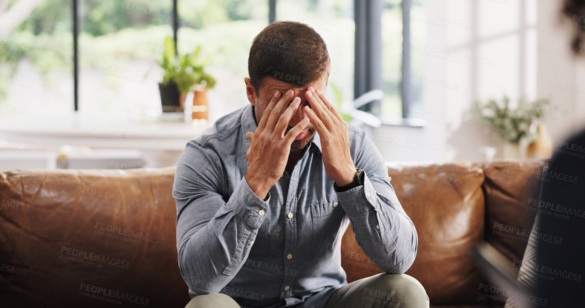 Buy stock photo Mental health, sofa and man with psychologist in office for support, life coaching or sadness. Anxiety, therapy and psychiatrist with male person with depression for guidance, help or consultation.