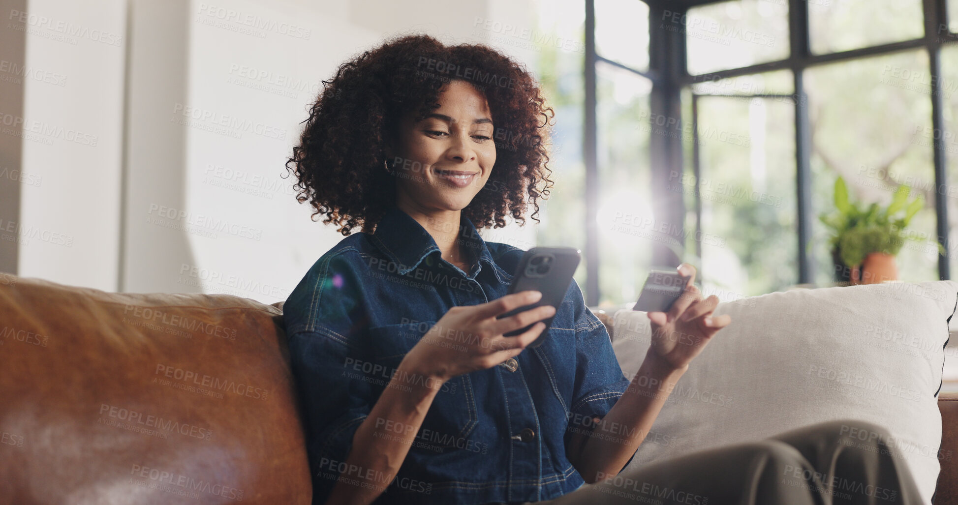 Buy stock photo Credit card, happy and black woman with phone on sofa for online shopping, purchase and payment. Home, ecommerce and person with smartphone on bank app for subscription, website sale and transaction