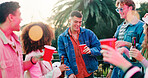 Drink, fun and party with friends outdoor together for bonding, celebration or social gathering. Alcohol, dance and reunion with group of people in backyard of home for energy, holiday or weekend