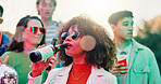 Outdoor, friends and woman with beer at party, disco ball or social gathering for weekend celebration. Hang out, reunion event and people with alcohol beverage for fun, rave and drinking together
