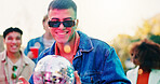Friends, sunglasses and happy man with disco ball at party, social event and get together for reunion. Smile, shades and person with group for weekend bonding, outdoor rave and summer festival fun