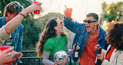 Buy stock photo Outdoor, party or happy people with drinks on balcony, toast or social gathering for weekend celebration. Hang out, reunion event or group of friends with alcohol beverage for cheers, fun and excited