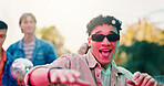Happy, man and sunglasses outdoor at party with college friends, social gathering and dance on weekend. Person, smile and shades at university disco with people, summer holiday and music for event.