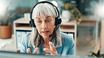 Mature, woman and consultant with headset in call center for customer service or virtual assistance. Female person, agent or talking with mic for web support, online help or communication in office