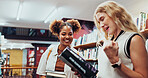 Tablet, college and women in library, excited or ideas for academic project, smile or cheering. University, friends or tech for scholarship, conversation or achievement with test results or elearning