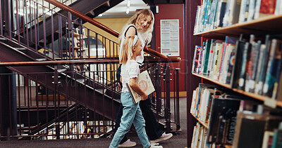 Buy stock photo Mother, daughter and walk in library with book, knowledge support or bonding together for development. Happy, mom and child search in bookshop for english literature, education or guidance for growth