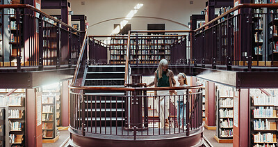 Buy stock photo Happy, grandma and holding hands with child in library for education, learning or literature. Grandparent, kid or helping granddaughter on staircase in bookstore or shop for knowledge, story or novel
