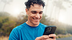 Fitness, happy and man with phone in nature for exercise, fitness and workout info on mobile app. Sports, athlete and person with smartphone for health progress, wellness and active hobby outdoor