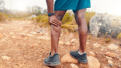 Buy stock photo Fitness, hands and athlete with leg pain in nature for cardio accident, muscle strain and discomfort. Back, feet and person with calf injury for trail running mistake, nerve compression and fatigue