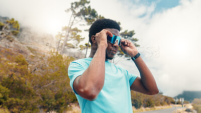 Buy stock photo Exercise, outdoor and black man with sunglasses for uv protection, wellness and challenge. Nature, athlete and person with shield eyewear, polarized lenses or workout for health benefits and fitness