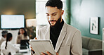 Fashion, meeting or man in office with tablet, industry research or clothing draft in creative process. Reading, scroll or design manager with tech, style development or trend review in catalog.