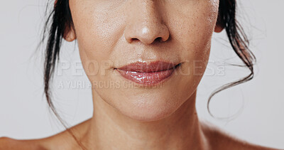 Buy stock photo Woman, lips and beauty with makeup in studio for cosmetics or facial on a white background. Closeup, female person or model with mouth, gloss or glow up for shine, cosmetology or skincare aesthetic