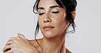 Skincare, touch or person in studio with smooth skin, shine or glow in facial care. Wellness, space or woman on white background with confidence, dermatology or natural cosmetics for soft feel.
