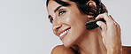 Happy woman, facial and skincare with gua sha for anti aging massage on a white studio background. Female person, model or smile with jade or stone for beauty treatment, cosmetology or dermatology