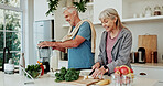 Kitchen, chop or senior couple with blender for smoothie,   prepare ingredients or detox drink for health. Smile, cutting fruit or old people with diet juice for nutrition, home or breakfast shake