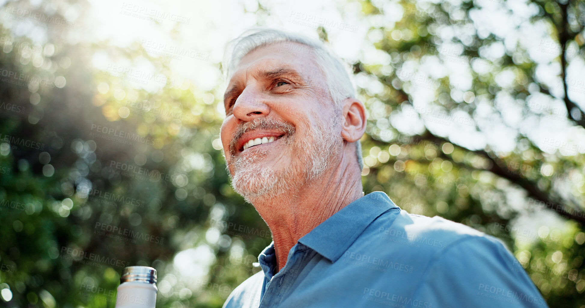Buy stock photo Exercise, bottle and old man in garden, thinking and workout for health benefits, smile and low angle, Nature, reflection and senior person in backyard, hydration and thirsty for liquid and fitness
