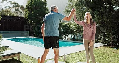Buy stock photo Fitness, high five and old couple in garden, smile and bonding together for relationship, humor or love. Swimming pool, senior man and happy woman in backyard, goals and exercise for health benefits