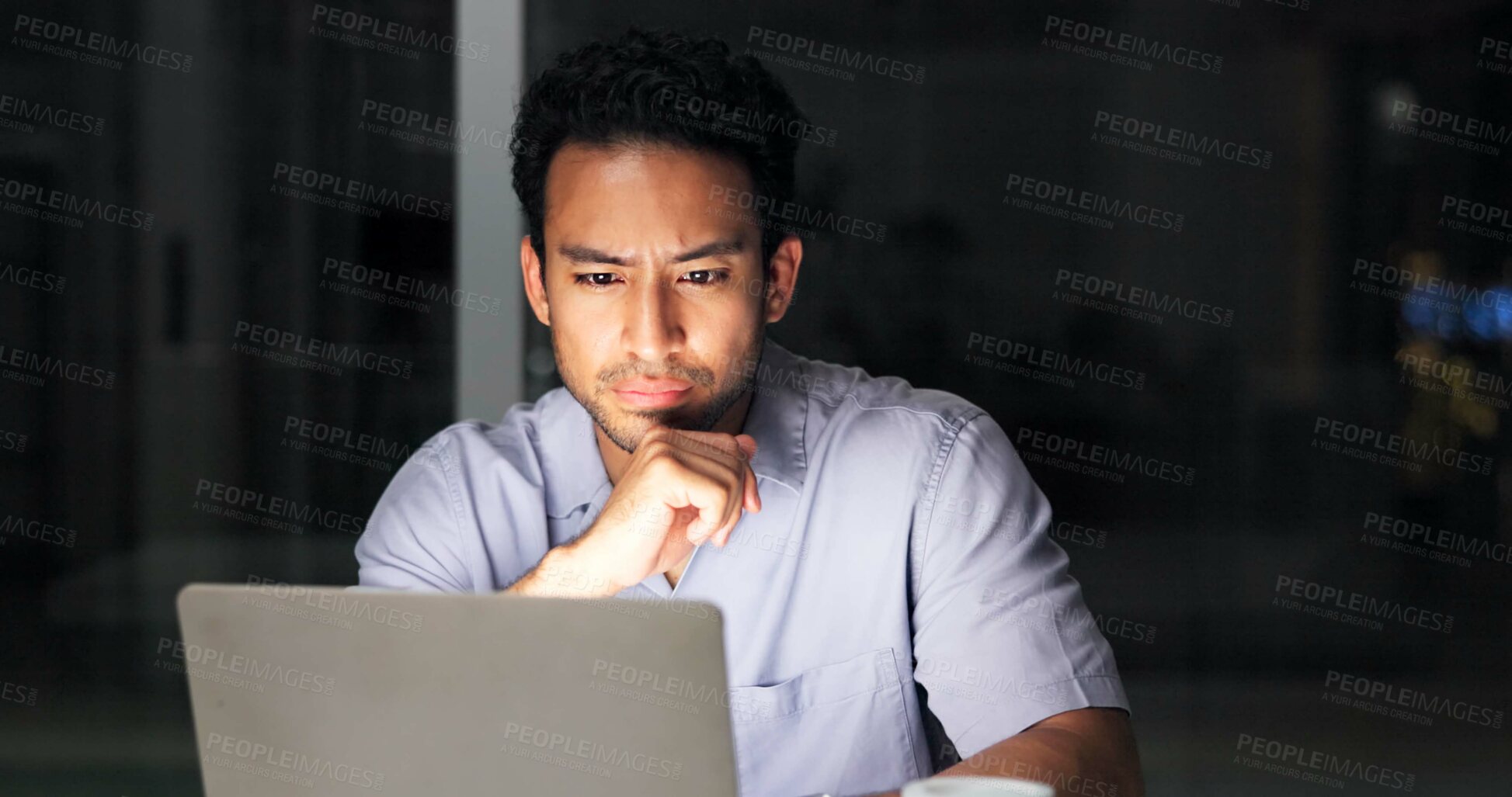 Buy stock photo Laptop, reading and thinking with business man in office at night for development or problem solving. Computer, information and planning with employee person at desk in dark workplace for research