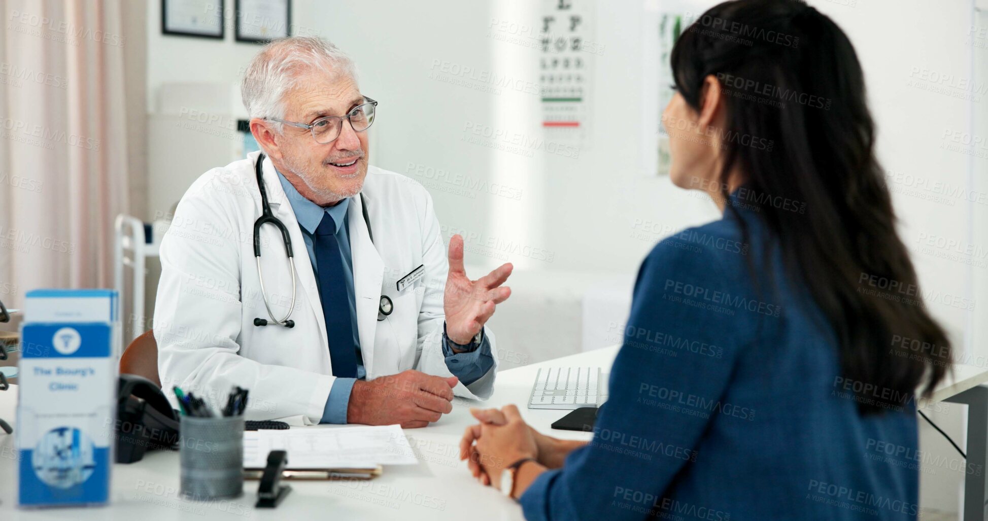 Buy stock photo Happy, consultation and doctor with woman in hospital with medical diagnosis in office with feedback. Smile, checkup and mature healthcare worker with female patient for planning treatment in clinic.