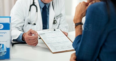 Buy stock photo Paperwork, doctor and hands of patient in office, healthcare insurance form or personal details record. Appointment, clipboard or physician with person in clinic for support, medical history or info