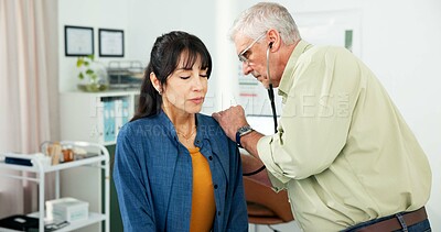 Buy stock photo Consultation, stethoscope and doctor with woman in hospital for breathing, chest infection or pain. Checkup, discussion and mature healthcare worker with patient for medical examination in clinic.