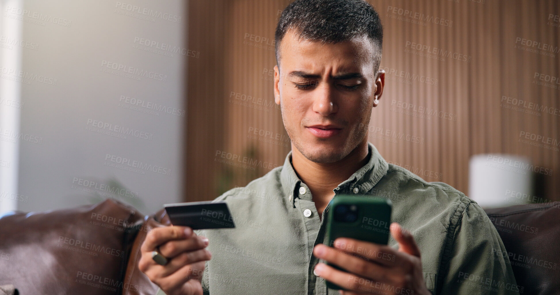 Buy stock photo Credit card, confused and man with phone in home with payment error, purchase and online shopping. Ecommerce, doubt and person with bank info on smartphone for glitch, mistake and transaction issue