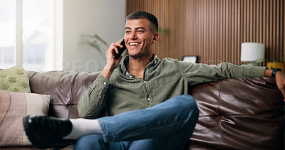 Buy stock photo Man, phone call and relax on couch with smile, happy and chat or gossip in home living room. Person, smartphone and conversation on sofa with social networking, communication and speaking in lounge