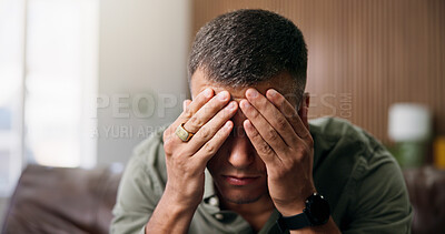 Buy stock photo Frustrated, man and headache with anxiety in home for loneliness, mistake or mental health on sofa. Tired, migraine or male person with depression or stress for fatigue, pressure or strain in house