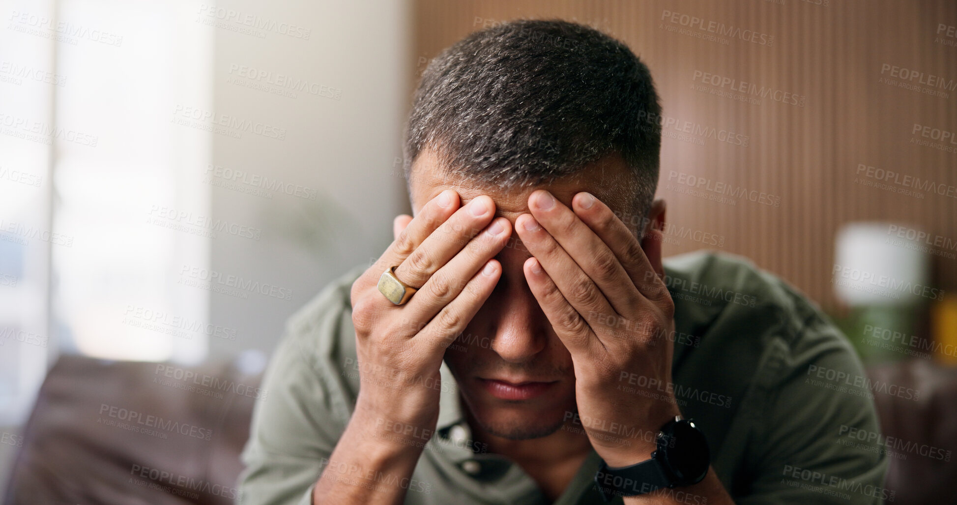 Buy stock photo Frustrated, man and headache with anxiety in home for loneliness, mistake or mental health on sofa. Tired, migraine or male person with depression or stress for fatigue, pressure or strain in house