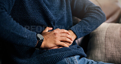 Buy stock photo Man, hands or stomach ache with indigestion, constipation or diarrhea for pain on sofa in home. Closeup, male person or sore belly with gastrointestinal reflux for virus or bladder infection in house