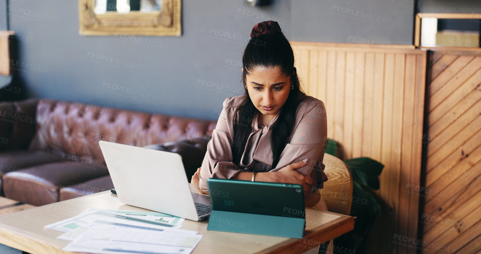 Buy stock photo Remote work, documents and woman on tech in cafe for finance review, budget planning and research. Coffee shop, reading and person on computer with paperwork, graph and charts for financial analysis