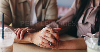Buy stock photo Holding hands, couple and love with milkshake at cafe with connection, care and bonding on date. Man, woman and partnership at restaurant for drinks with relationship, trust and loyalty at diner