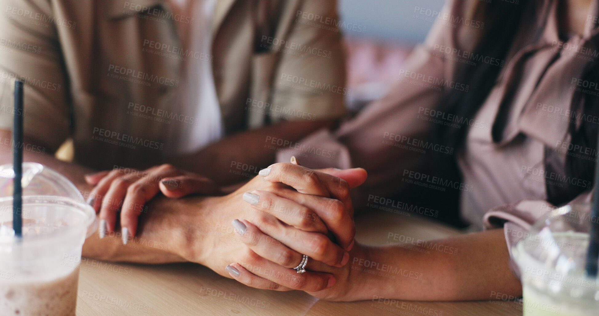 Buy stock photo Holding hands, couple and love with milkshake at cafe with connection, care and bonding on date. Man, woman and partnership at restaurant for drinks with relationship, trust and loyalty at diner
