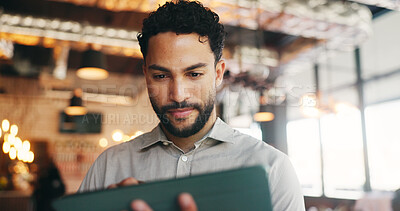 Buy stock photo Tablet, happy and man in restaurant for online inventory, update website and booking list. Small business, hospitality and person on tech for digital menu, stock checklist and work schedule in cafe