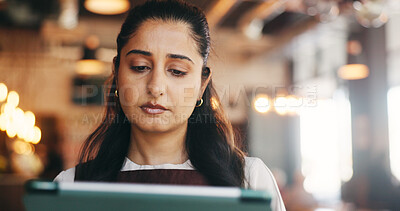 Buy stock photo Tablet, reading and woman in restaurant for online inventory, update website and orders. Small business, hospitality and person on tech for digital menu, stock checklist and work schedule in cafe