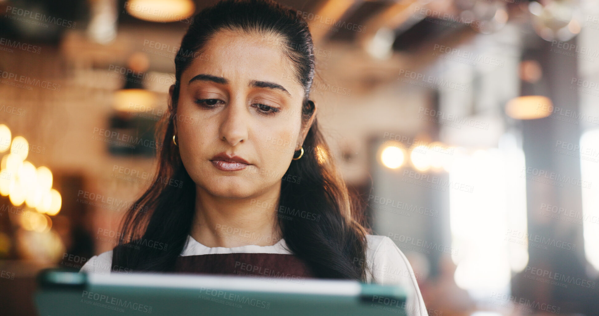 Buy stock photo Tablet, reading and woman in restaurant for online inventory, update website and orders. Small business, hospitality and person on tech for digital menu, stock checklist and work schedule in cafe