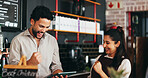 Happy, people and celebration in restaurant with tablet, success or notification for online order goal. Coworkers, fist pump or teamwork in diner with tech, hospitality achievement or accomplishment.