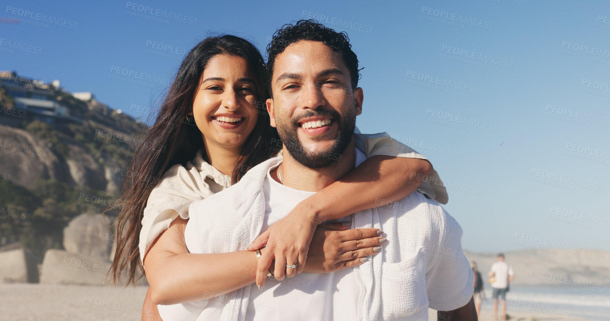 Buy stock photo Love, hug and portrait of couple by beach on holiday, travel or getaway together for honeymoon. Smile, care and woman embrace man by ocean for seaside vacation for marriage, romance or happiness.