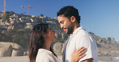 Buy stock photo Date, love and smile of couple on beach together for anniversary, honeymoon or romance. Holiday, travel and vacation with happy people outdoor in nature for relationship, security or summer bonding