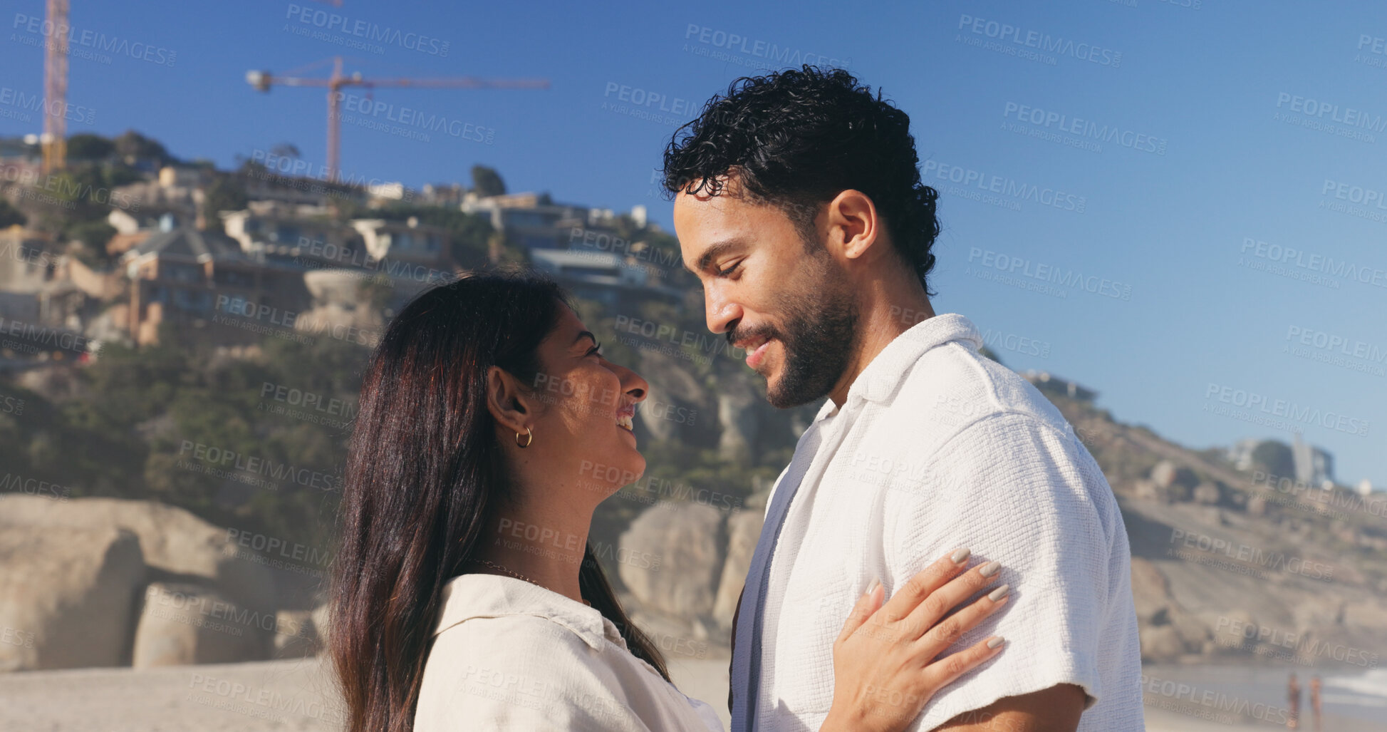 Buy stock photo Date, love and smile of couple on beach together for anniversary, honeymoon or romance. Holiday, travel and vacation with happy people outdoor in nature for relationship, security or summer bonding