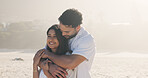 Holiday, hug and smile of couple on beach together for anniversary, date or honeymoon in summer. Love, travel and vacation with happy people embracing outdoor for bonding, relationship or security