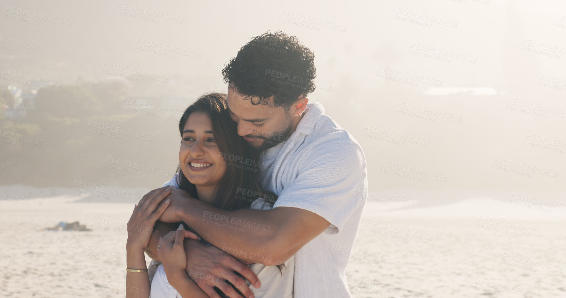Buy stock photo Holiday, hug and smile of couple on beach together for anniversary, date or honeymoon in summer. Love, travel and vacation with happy people embracing outdoor for bonding, relationship or security
